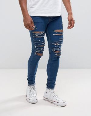 Обтягивающие джинсы с рваной отделкой Criminal Damage. Цвет: синий