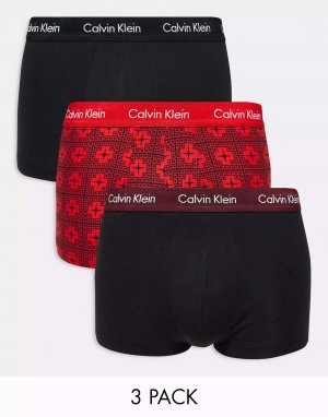Три пары плавок с низкой посадкой принтованными красными и черными поясами Calvin Klein