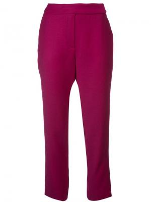 Зауженные брюки Osman. Цвет: фиолетовый