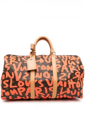 Дорожная сумка Keepall 50 2009-го года с монограммой Louis Vuitton. Цвет: оранжевый