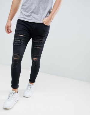 Супероблегающие джинсы скинни с рваной отделкой 11 Degrees. Цвет: черный