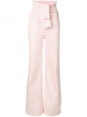 Расклешенные джинсы с завязками Ulla Johnson. Цвет: розовый