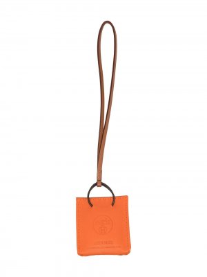 Подвеска для сумки pre-owned с тисненым логотипом Hermès. Цвет: оранжевый