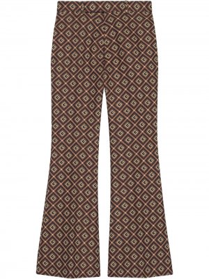 Расклешенные брюки с узором GG Damier Gucci. Цвет: красный