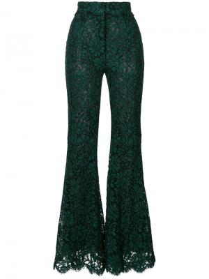 Расклешенные кружевные брюки Dolce & Gabbana. Цвет: зеленый