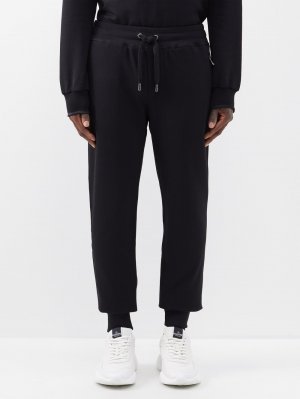 Спортивные брюки из хлопкового джерси с бляшкой-логотипом , черный Dolce & Gabbana