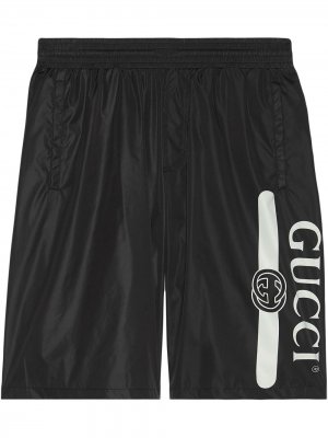 Плавки-шорты с логотипом Gucci. Цвет: черный