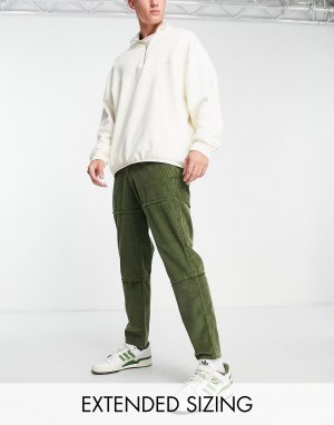 Зеленые зауженные вельветовые брюки с рваными швами ASOS DESIGN