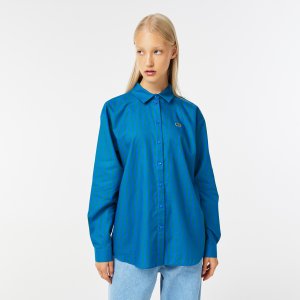 Блузы и рубашки Женская рубашка Lacoste. Цвет: синий