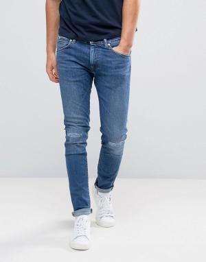 Узкие заниженные джинсы с рваными коленями ED-85 Edwin. Цвет: синий