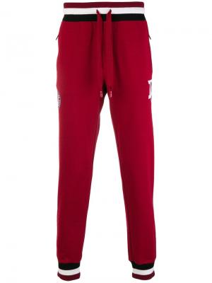 Суженные спортивные брюки со шнурком Dolce & Gabbana. Цвет: красный
