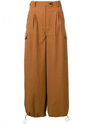 Зауженные брюки Salvatore Ferragamo. Цвет: коричневый