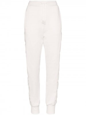 Спортивные брюки с тисненым логотипом Dolce & Gabbana. Цвет: белый