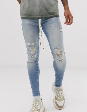 Синие выбеленные джинсы скинни с логотипом на колене и рваной отделкой -Синий The Couture Club