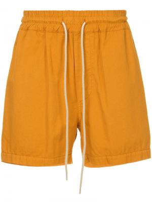 Короткие пляжные шорты Bassike. Цвет: желтый