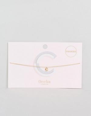 Ожерелье-чокер из цепочки с подвеской в виде буквы C Orelia. Цвет: золотой