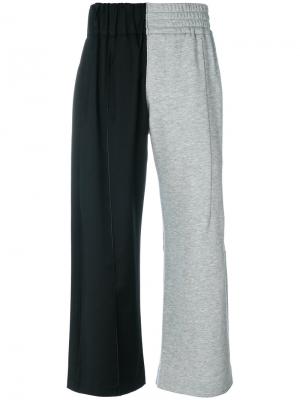 Асимметричные брюки Vejas. Цвет: чёрный