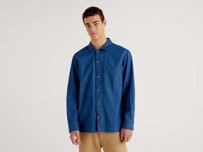 Джинсовая рубашка с накладным карманом Benetton. Цвет: синий