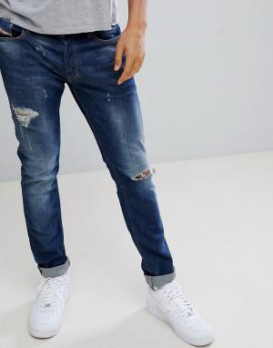 Суженные книзу джинсы с заплатками Only & Sons. Цвет: синий
