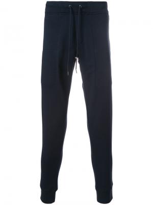 Спортивные брюки с карманами на молнии Woolrich. Цвет: синий
