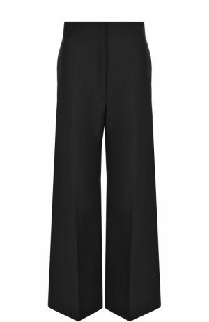 Шерстяные расклешенные брюки со стрелками Christophe Lemaire. Цвет: черный