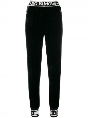 Спортивные брюки с логотипом на лампасах Dolce & Gabbana. Цвет: черный
