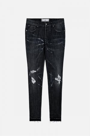 Свободные в бедрах джинсы с рваными деталями Ami Alexandre Mattiussi. Цвет: черный