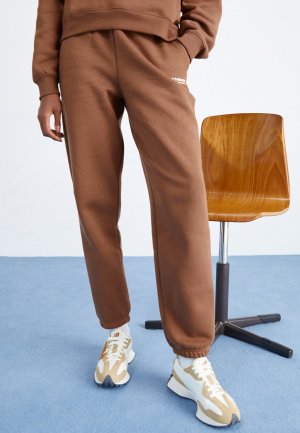 Спортивные брюки Linear Heritage Brushed Back , цвет pinecone New Balance