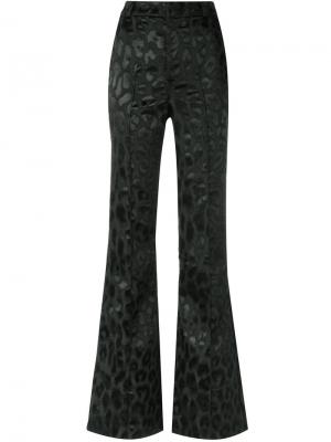 Расклешенные брюки с анималистическим принтом Tufi Duek. Цвет: черный
