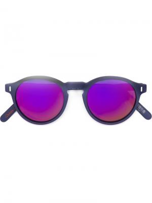 Солнцезащитные очки в круглой оправе Philippe Rouge. Цвет: розовый и фиолетовый