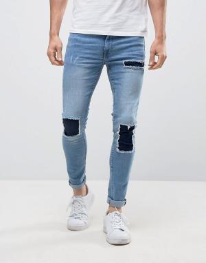 Синие супероблегающие джинсы с заплатками New Look. Цвет: синий