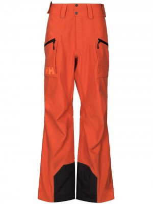 Лыжные брюки Helly Hansen. Цвет: оранжевый
