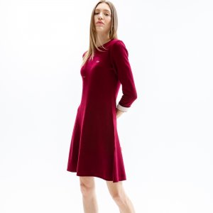 Платья и юбки Женское платье с рукавом три четверти Lacoste. Цвет: красный