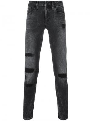 Джинсы скинни с рваными деталями Calvin Klein Jeans. Цвет: чёрный