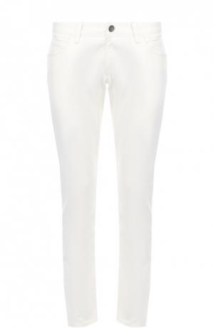 Зауженные джинсы с вышивкой на заднем кармане Dolce & Gabbana. Цвет: белый