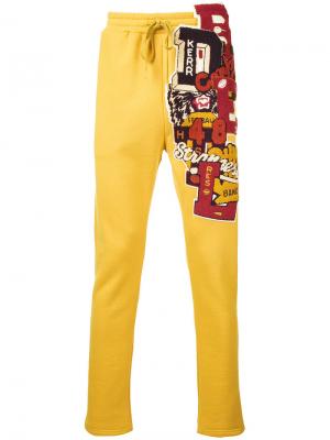 Спортивные брюки с вышивкой Doublet. Цвет: желтый