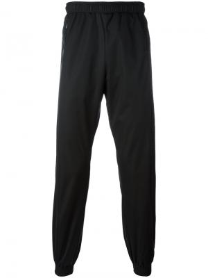 Спортивные брюки с эластичными щиколотками Cottweiler. Цвет: чёрный
