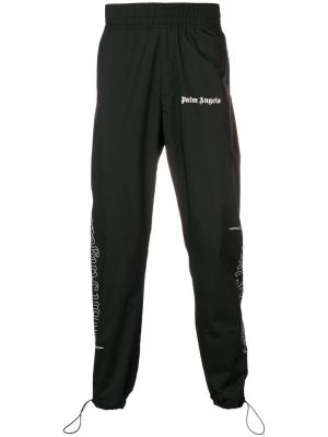 Спортивные брюки с логотипом сбоку Palm Angels. Цвет: черный