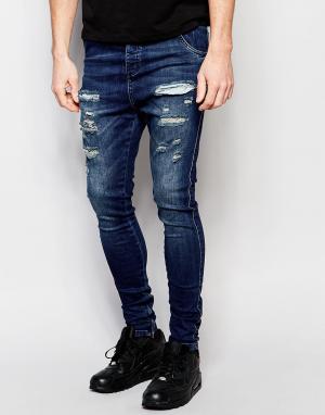 Рваные джинсы с заниженным шаговым швом SikSilk. Цвет: синий