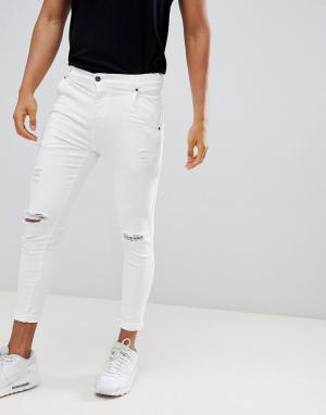 Белые супероблегающие джинсы с рваной отделкой SikSilk. Цвет: белый