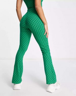 Зеленые брюки-клеш в стиле ретро Fila. Цвет: зеленый