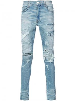 Рваные облегающие джинсы Amiri. Цвет: синий
